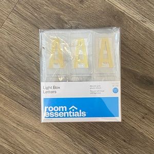 Gold light box letters